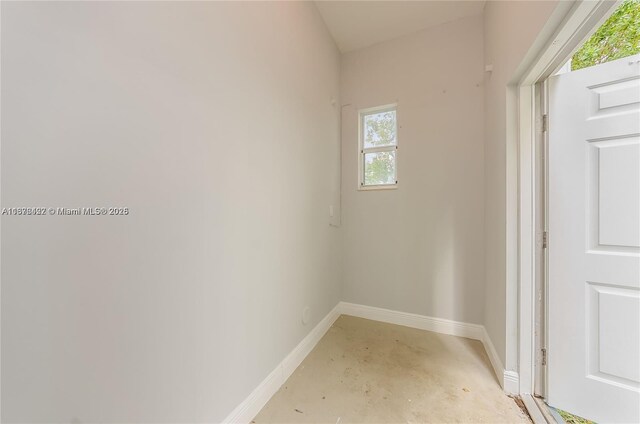 empty room featuring dark hardwood / wood-style flooring