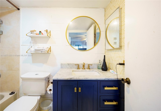 full bathroom featuring vanity, shower / tub combination, and toilet