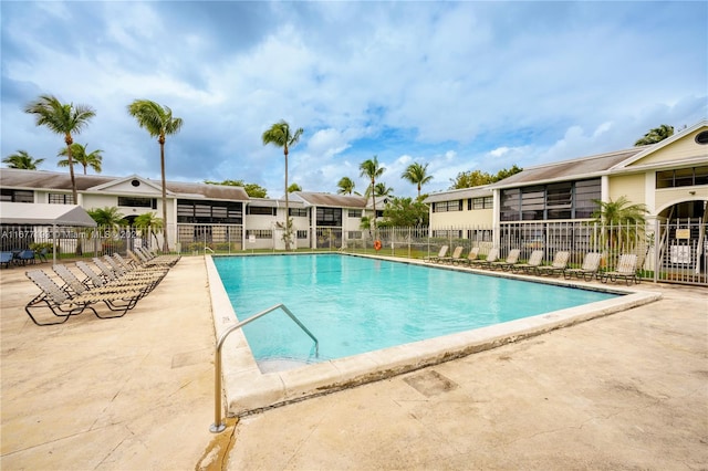 view of swimming pool with a patio area