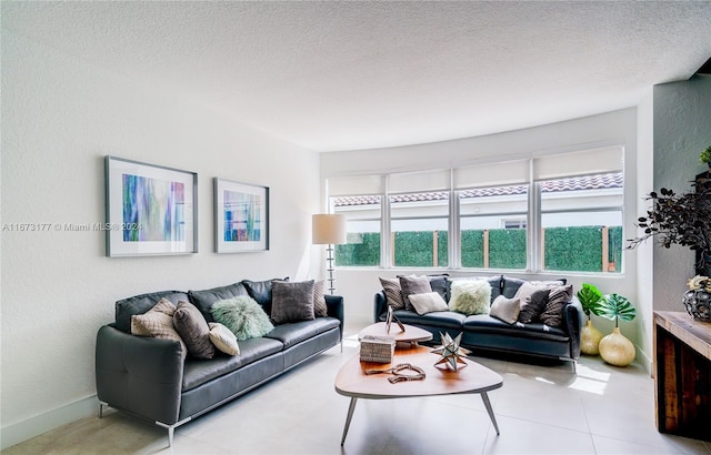 living room with a textured ceiling