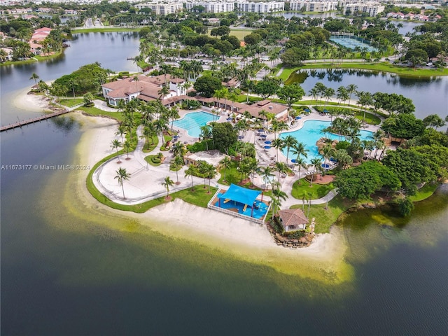 birds eye view of property featuring a water view