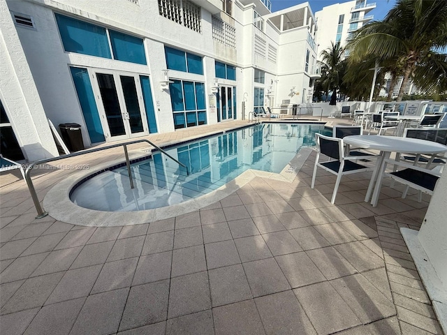 view of pool with a patio area