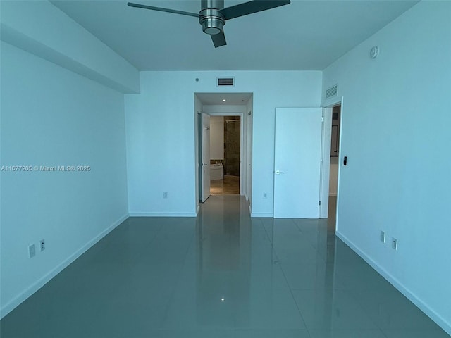 empty room featuring ceiling fan