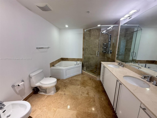 full bathroom featuring a bidet, shower with separate bathtub, vanity, and toilet