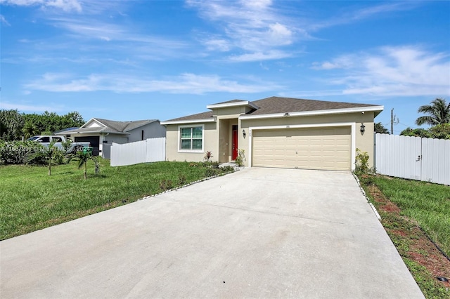 ranch-style house featuring a front yard and a garage