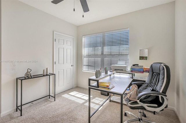 home office with light colored carpet and ceiling fan