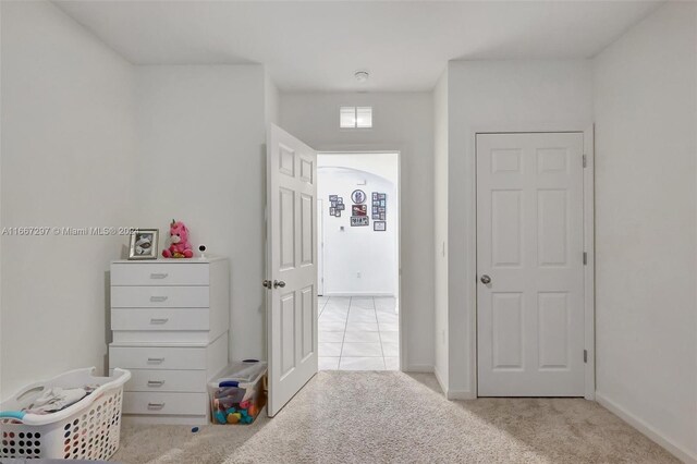 729 SW Lakehurst Dr, Port St Lucie, FL 34983 - carpeted bedroom with arched walkways and baseboards