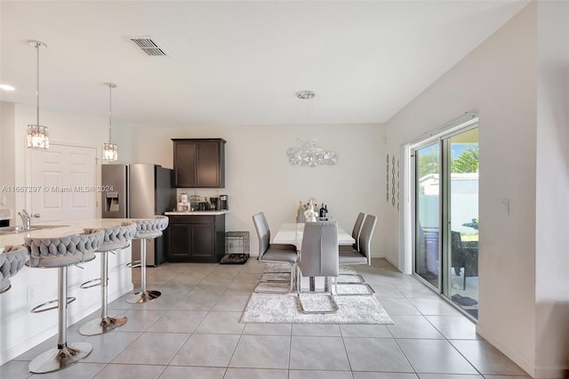 tiled dining area with sink