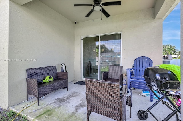 view of patio featuring ceiling fan