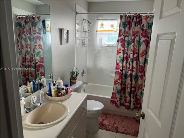 full bathroom featuring toilet, shower / bath combo, vanity, and tile patterned floors