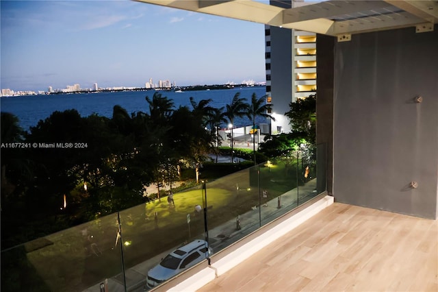 balcony at dusk with a water view