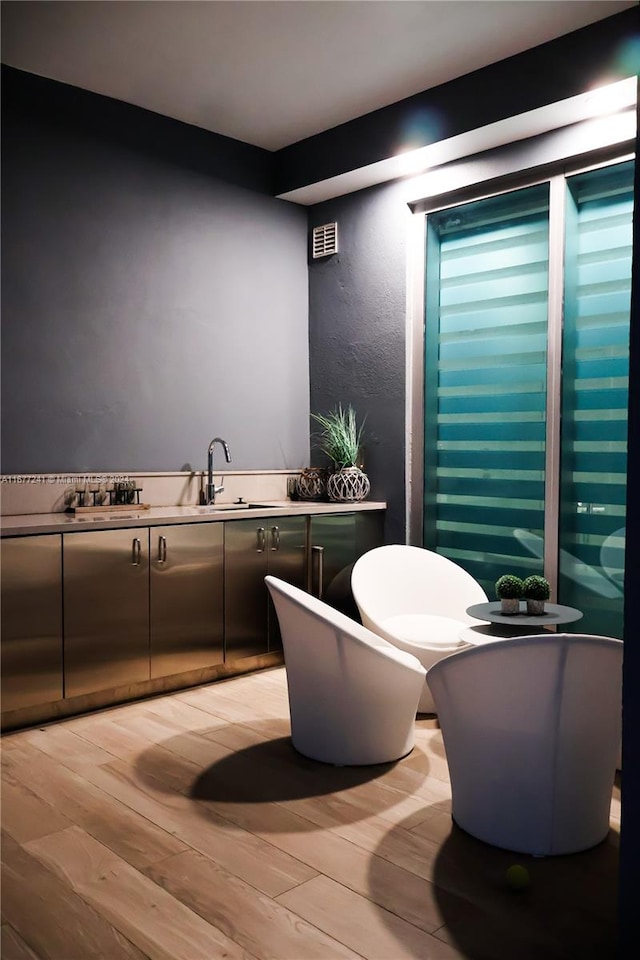 bathroom with vanity, wood-type flooring, and toilet