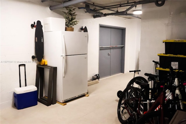 garage featuring white refrigerator