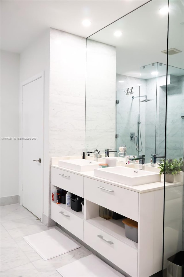 bathroom with vanity and walk in shower