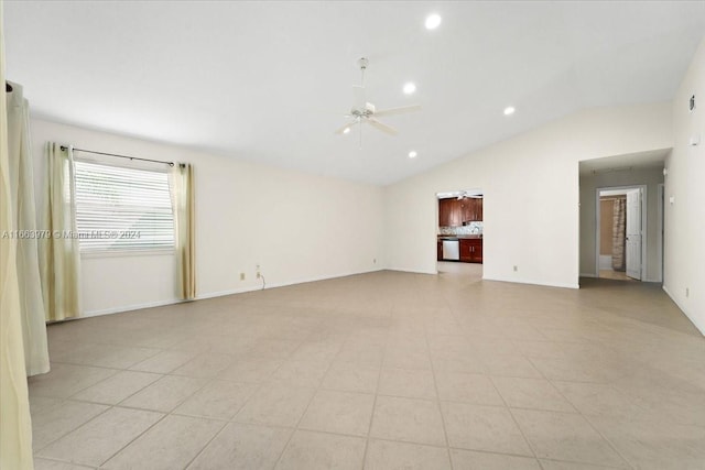 tiled spare room with ceiling fan and lofted ceiling