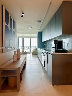 kitchen with light tile patterned floors