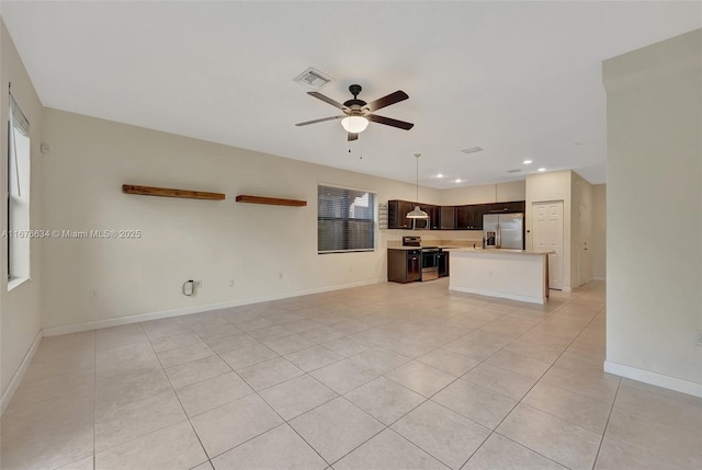 unfurnished living room with ceiling fan and light tile patterned flooring