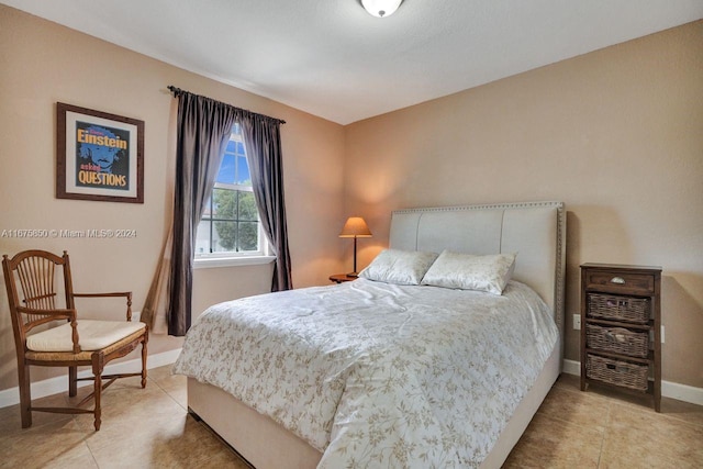 bedroom featuring tile patterned floors