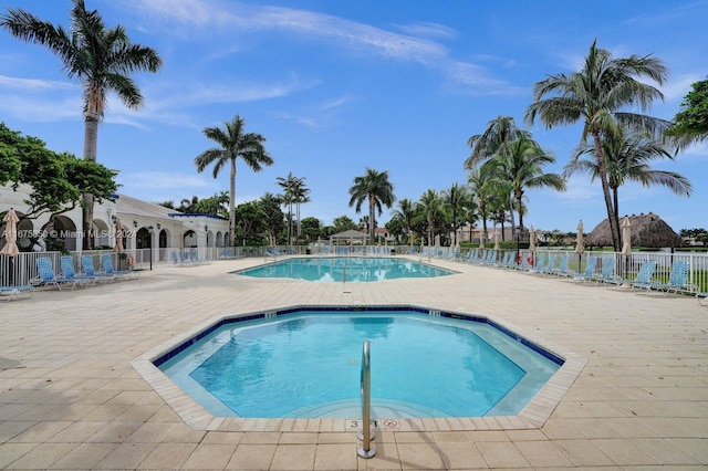 view of pool featuring a patio