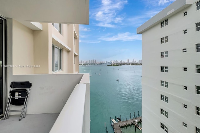 balcony featuring a water view