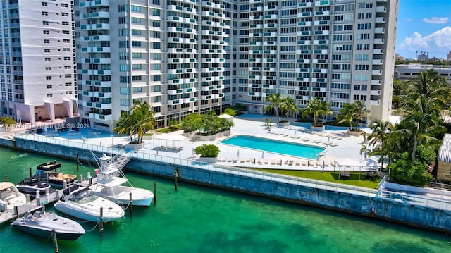 exterior space with a patio area and a water view