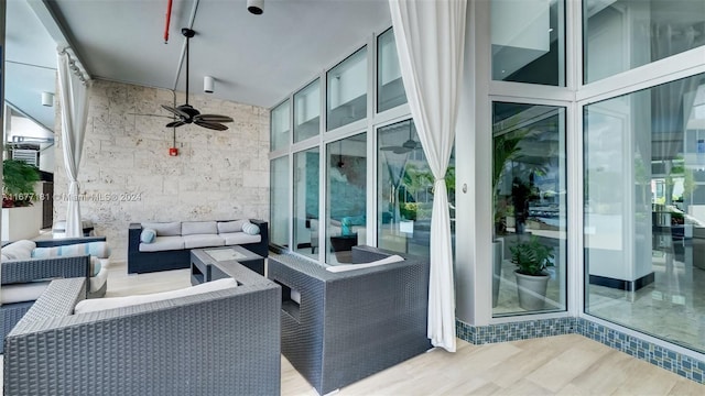 view of patio / terrace featuring an outdoor hangout area and ceiling fan