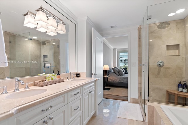 bathroom featuring vanity, crown molding, tile patterned floors, and independent shower and bath