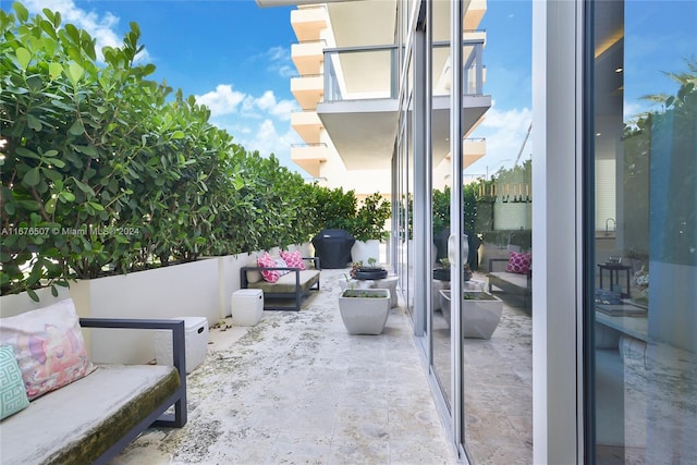 view of patio with a balcony