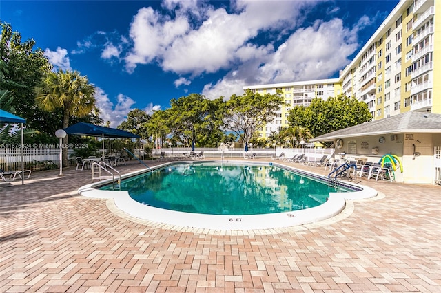 view of pool featuring a patio area