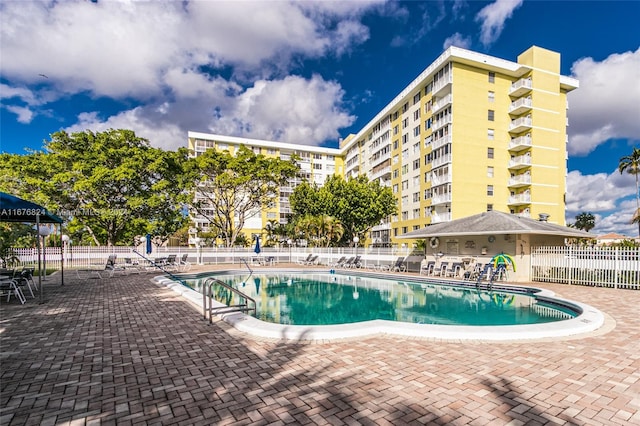 view of pool featuring a patio