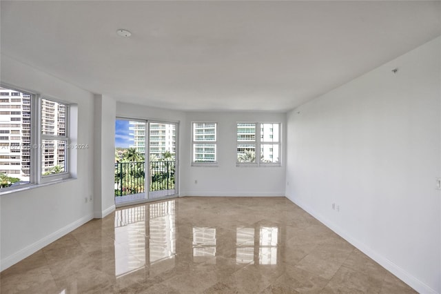 spare room with plenty of natural light