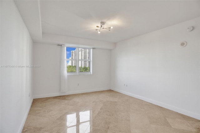 view of tiled spare room