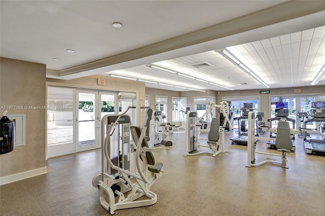 exercise room featuring french doors