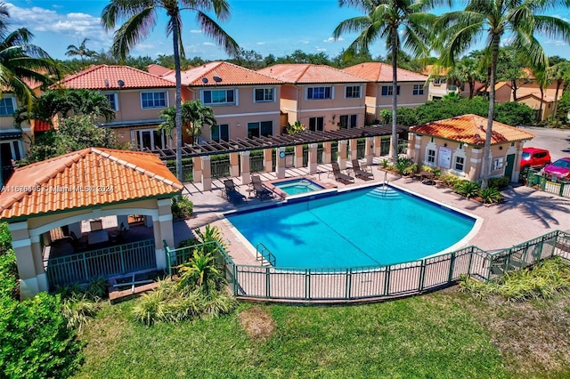 view of pool with a gazebo, a patio area, and a hot tub