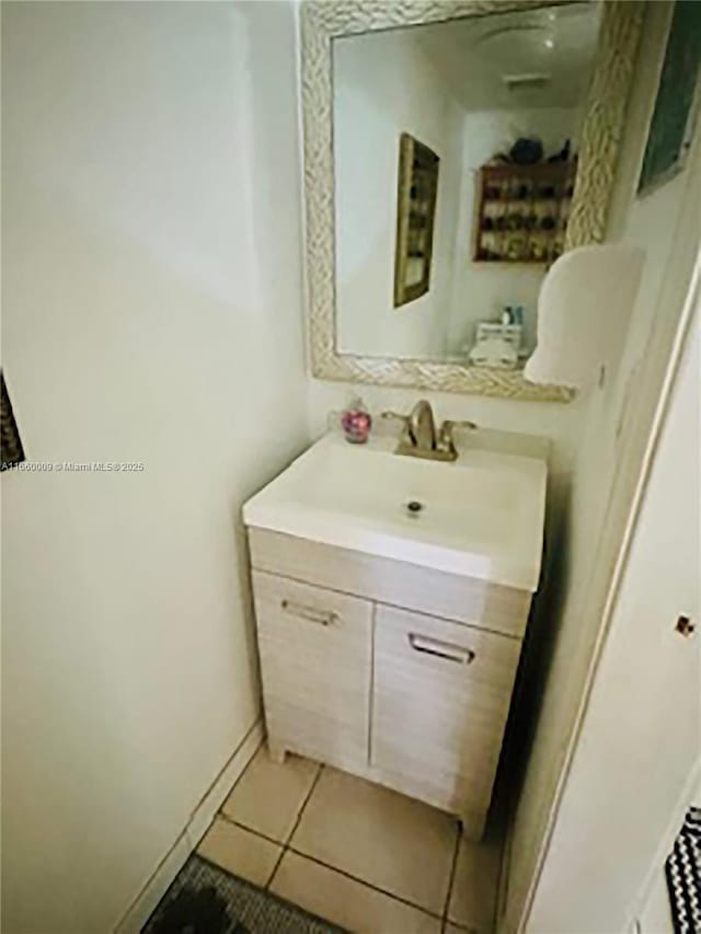 bathroom with vanity and tile patterned floors