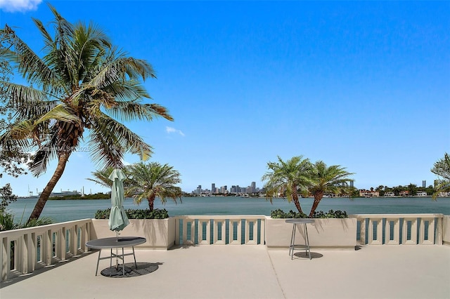 view of patio featuring a water view