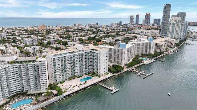 birds eye view of property featuring a water view