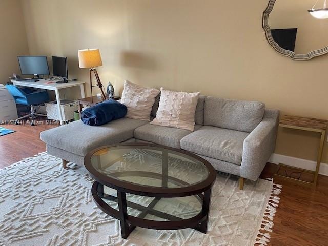 50 Menores Ave Unit 829, Coral Gables, FL 33134 - living area featuring wood finished floors, an office area, and baseboards
