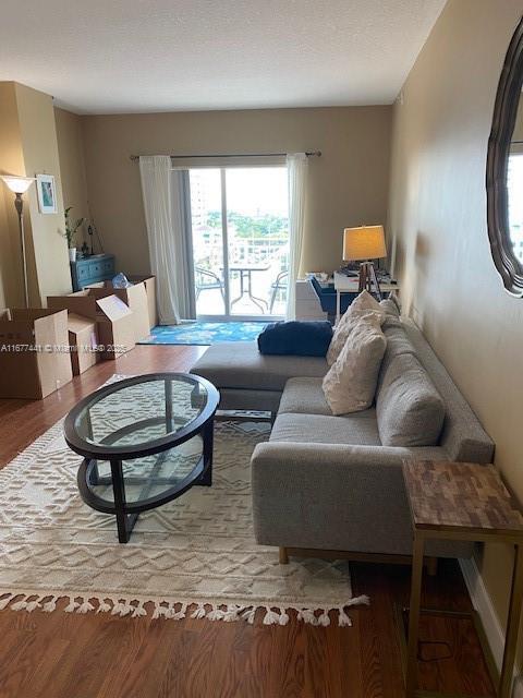 50 Menores Ave Unit 829, Coral Gables, FL 33134 - living area featuring wood finished floors