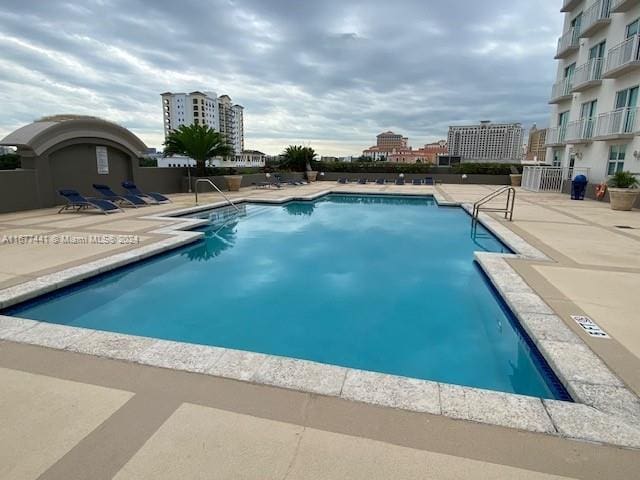 view of pool featuring a patio