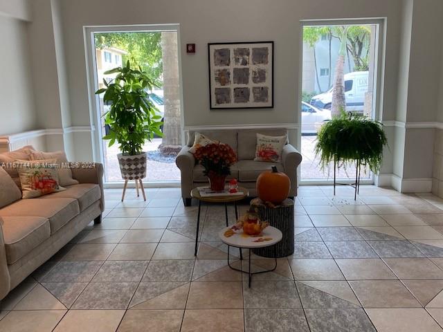 living room featuring light tile patterned flooring