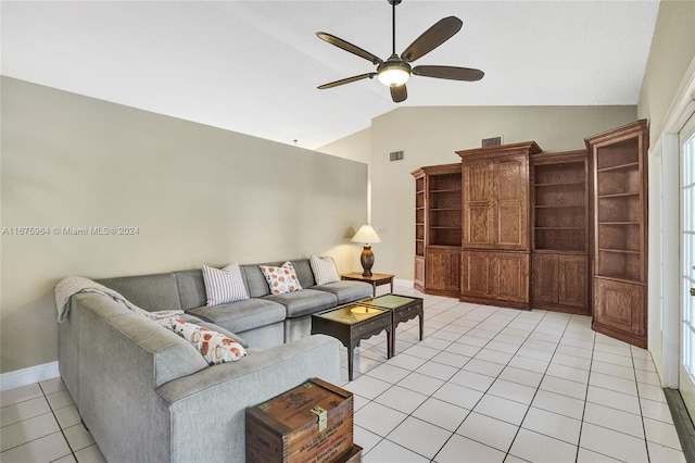 tiled living room with ceiling fan and lofted ceiling