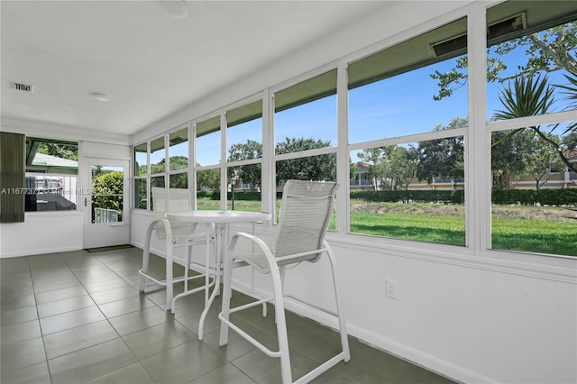 sunroom with plenty of natural light