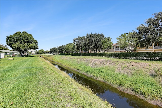 view of yard with a water view