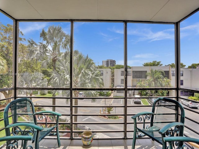 unfurnished sunroom featuring a healthy amount of sunlight