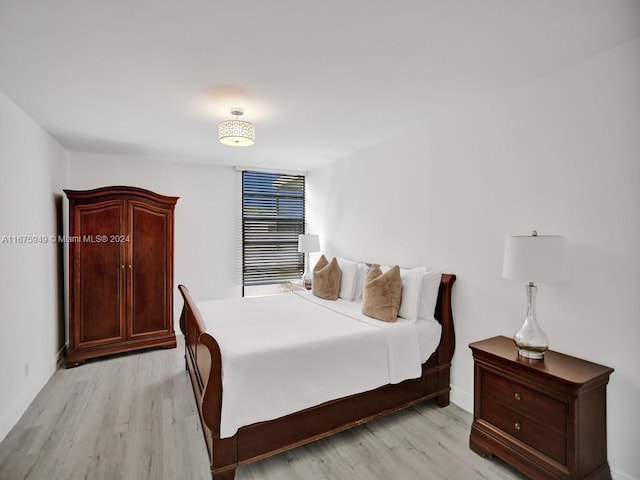 bedroom with light hardwood / wood-style flooring