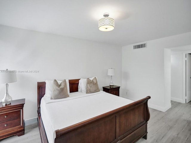 bedroom featuring light hardwood / wood-style flooring