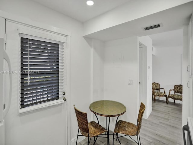 dining space featuring light hardwood / wood-style floors