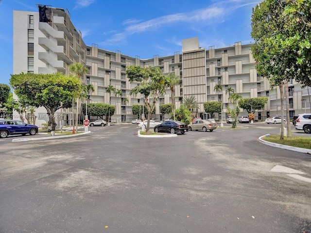 20400 W Country Club Dr Unit 301, Aventura, FL 33180 - view of apartment building / complex featuring uncovered parking