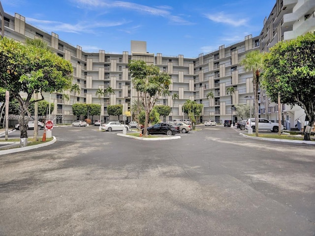 20400 W Country Club Dr Unit 301, Aventura, FL 33180 - view of apartment building / complex with uncovered parking
